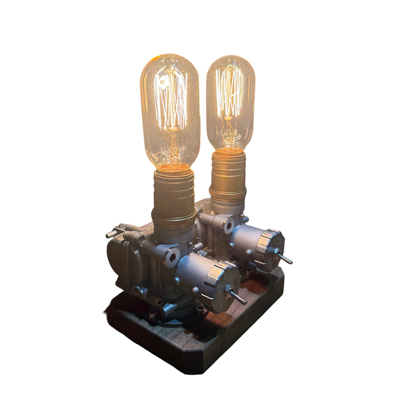 repurposed motorcycle carburetor steampunk table lamp, industrial desk light with vintage filament bulbs, wood base and adjustable metal structure