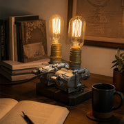 repurposed motorcycle carburetor steampunk table lamp, industrial desk light with vintage filament bulbs, wood base and adjustable metal structure