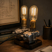repurposed motorcycle carburetor steampunk table lamp, industrial desk light with vintage filament bulbs, wood base and adjustable metal structure